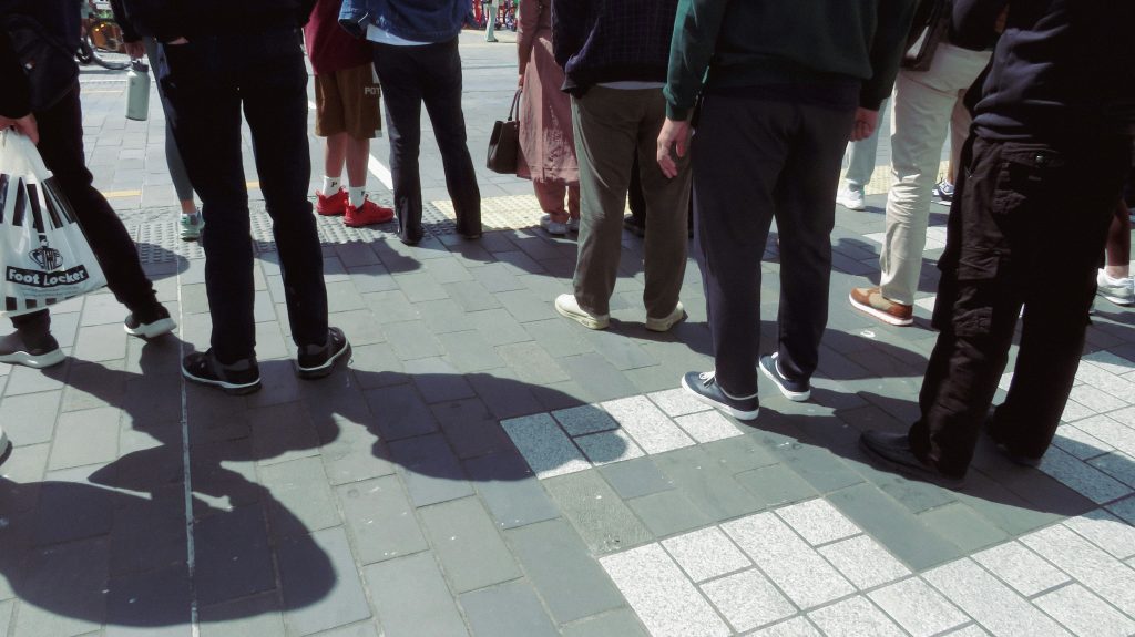 A group standing in a long line