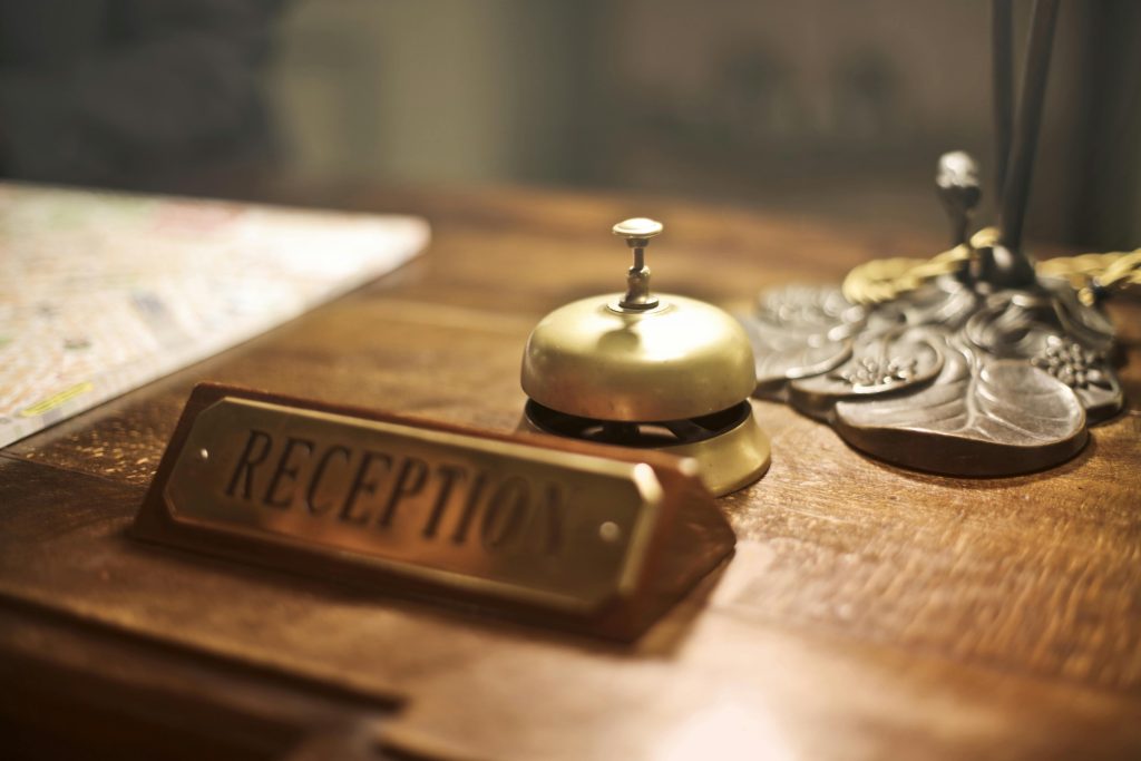 A reception desk to check in at a hotel