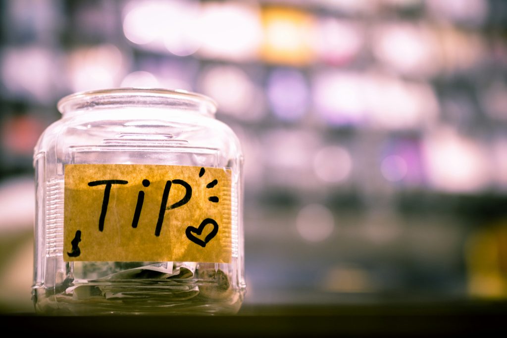 A tip jar on a table