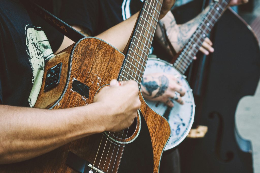 Music Row, Nashville: Person playing a guitar